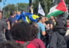 Скандал в Риме: во время манифестации неизвестные напали на людей с украинскими флагами (видео)