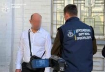 Тысяча долларов за оценку квартиры: в Харькове задержан госисполнитель на взятке
